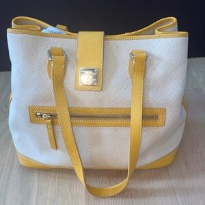 Dooney & Bourke, beige canvas with yellow mustard, leather satchel